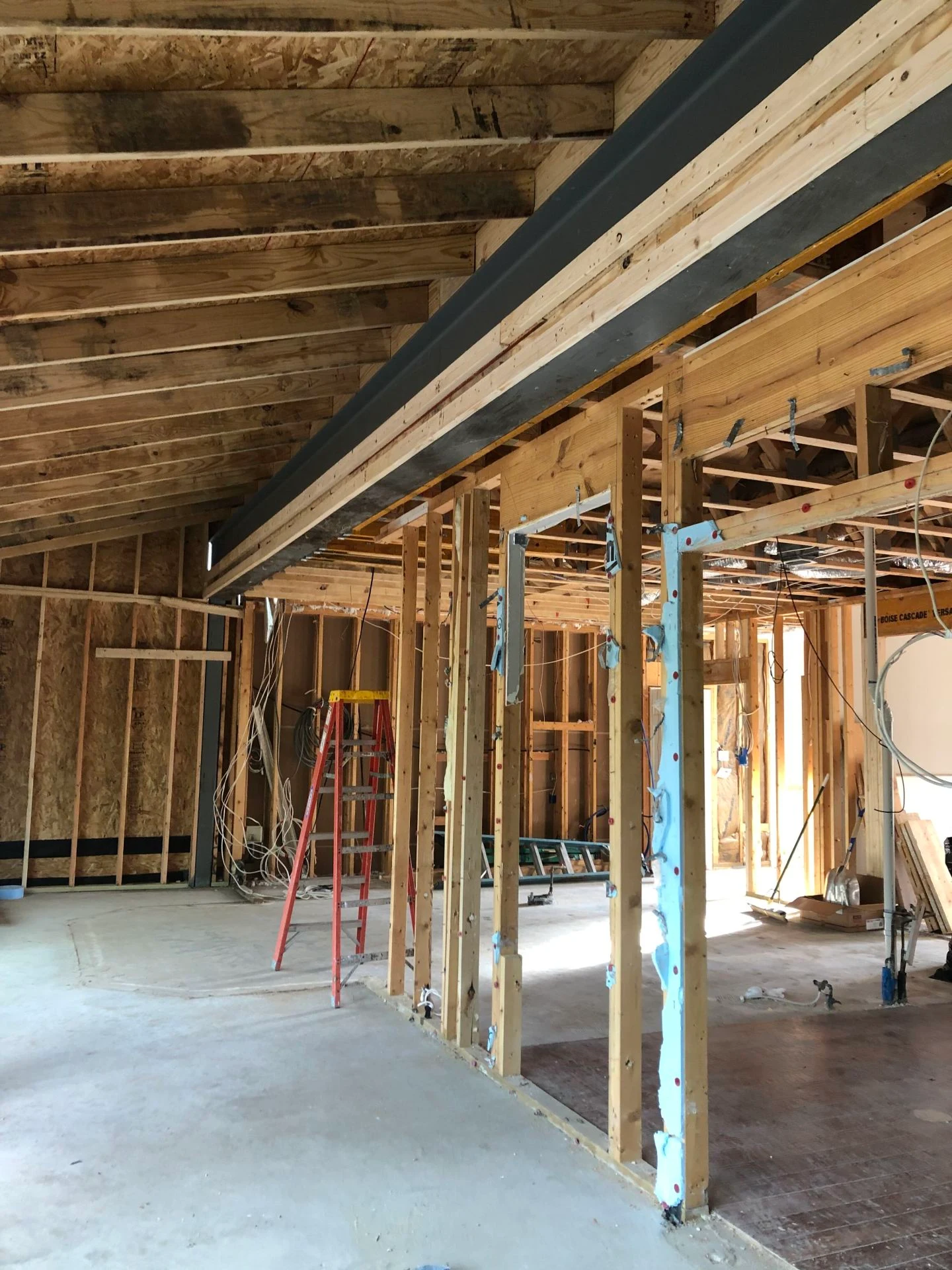 Residential Remodel Georgetown, TX Living and Dining room addition - structural steel beam supporting 2nd floor and roof above. — photo 2