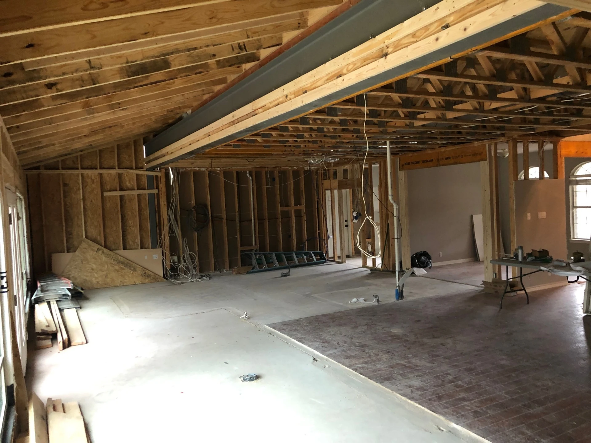 Residential Remodel Georgetown, TX Living and Dining room addition - structural steel beam supporting 2nd floor and roof above. — photo 1